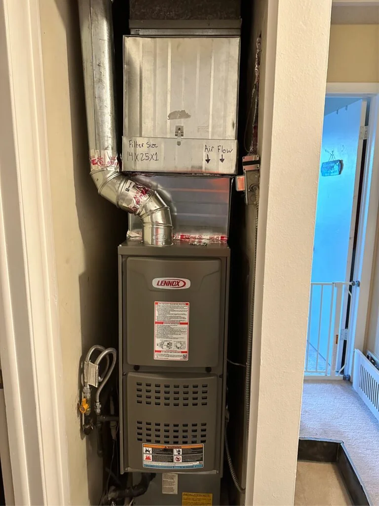 High angle scaled view of a newly installed modern energy efficient furnace system completed by Cool Ducts HVAC